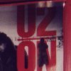 Display case with items from U2 from 1979 - 1983.